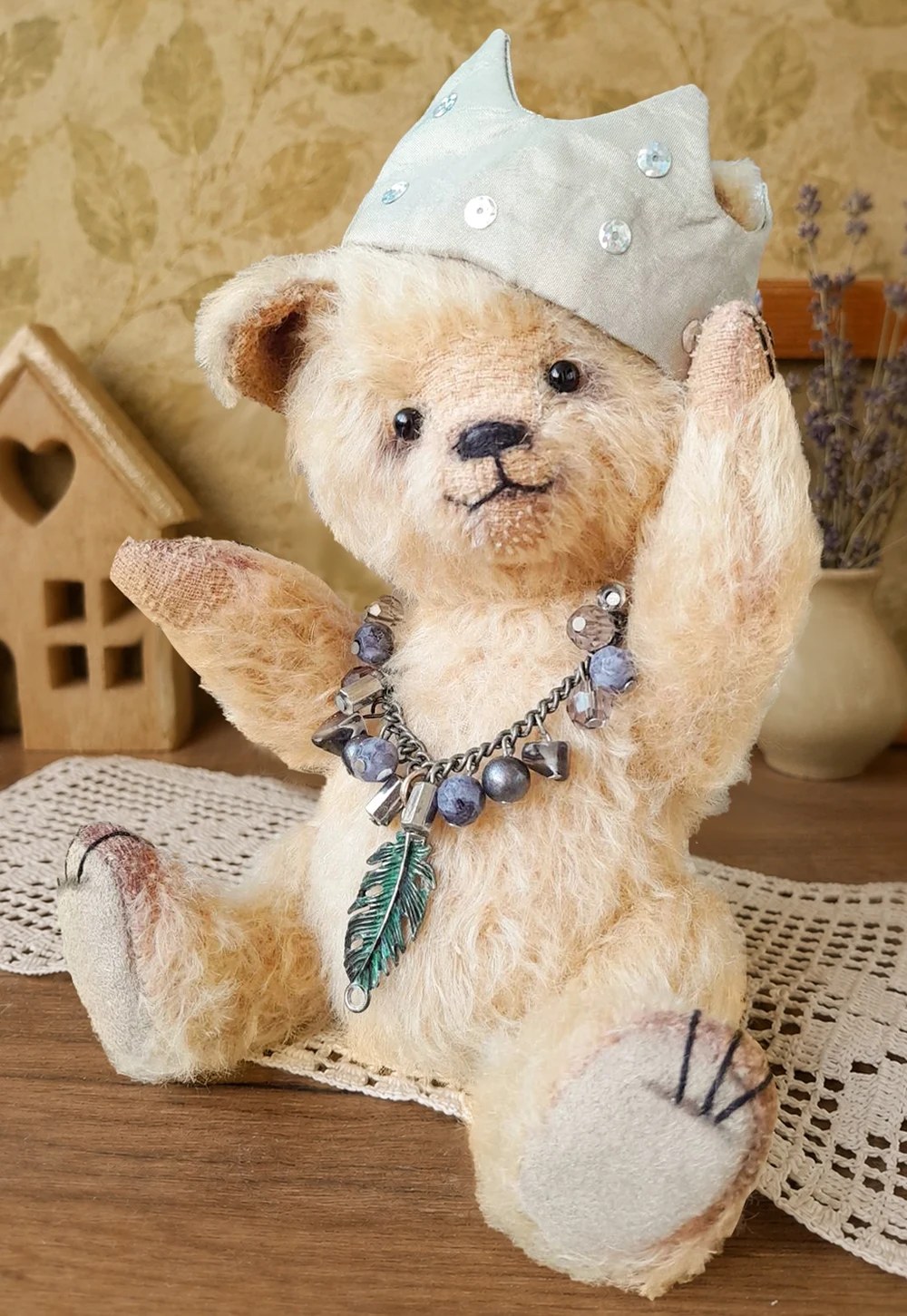 Mister Poppy, a handmade mohair teddy bear with a warm heart